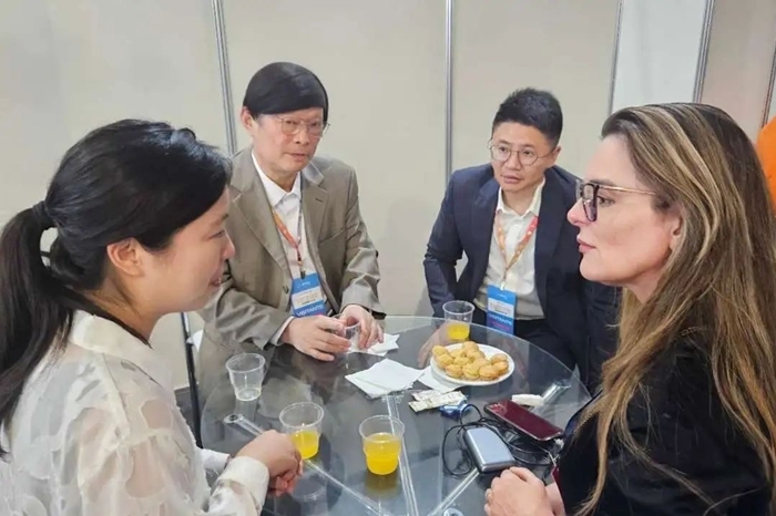 Secretary-general David Ping of the China Optical